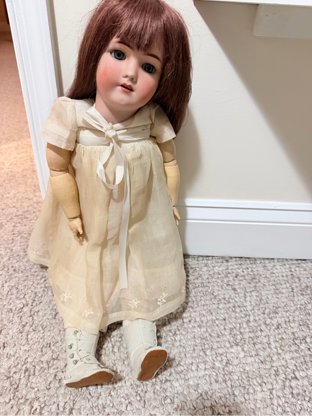 Vintage-Style Porcelain Doll in Cream Dress with Brown Hair
